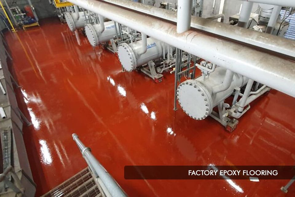 Factory epoxy flooring — red finish around chiller units